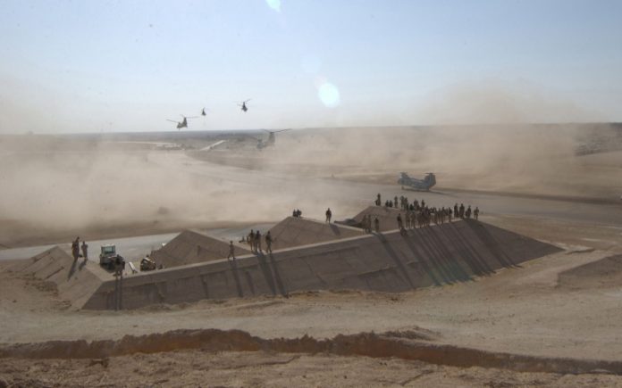 الجيش الأمريكي يعلن حالة الاستنفار القصوى وتحليق مكثف للطيران فوق سماء العراق قاعدة-أمريكية-في-الأنبار
